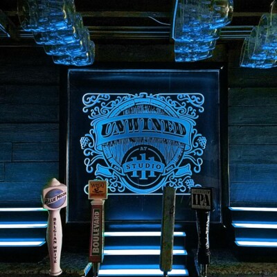 Illuminated glass etched logo